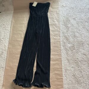 Peppermayo black jumpsuit with ruffled hem